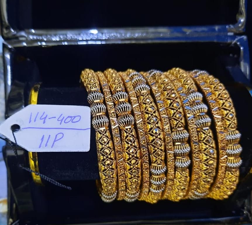 Collection of handcrafted gold bangles