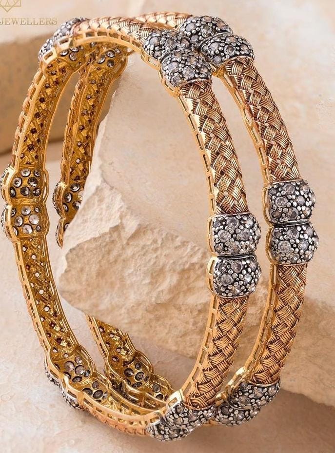Gold bangle with relief patterning
