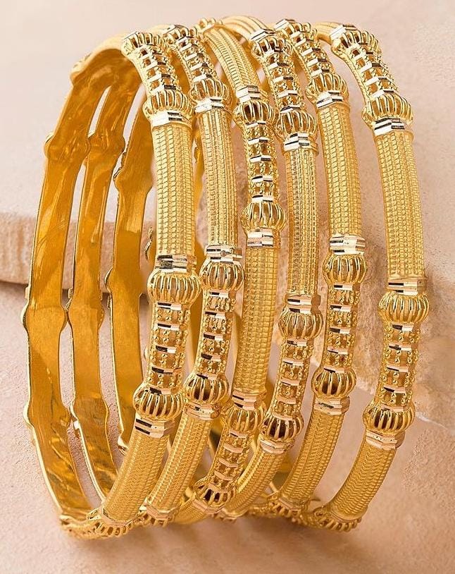 Artisan crafted gold bangle