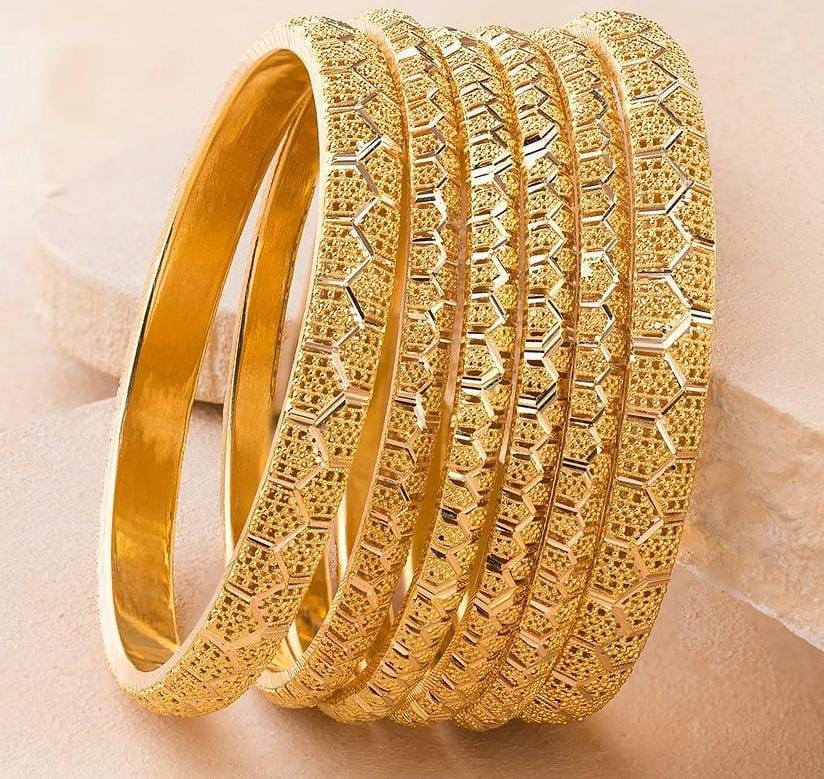 Bold statement gold bangle