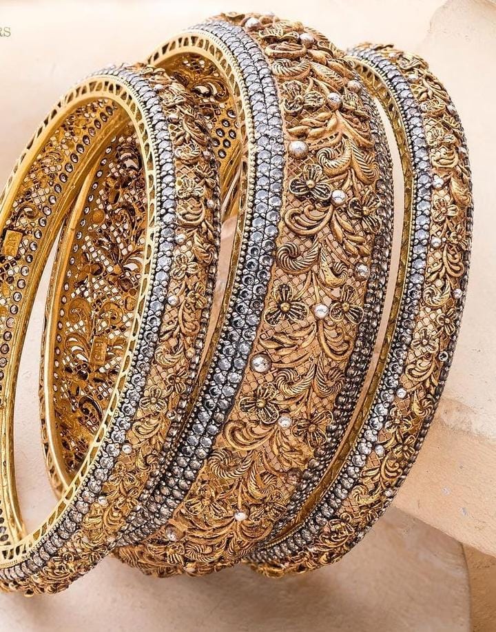 Gold bangle with diamond accents