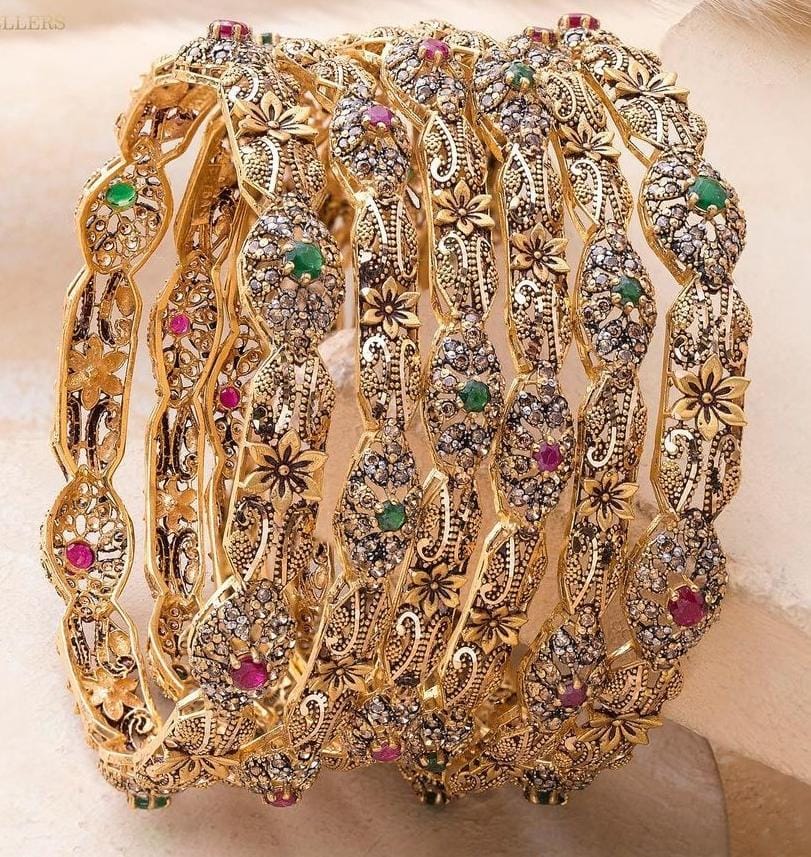 Two-tone gold bangle with white gold details