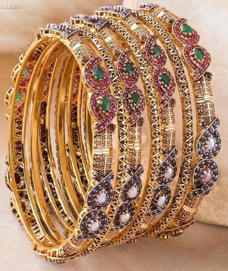 Set of ornate gold bangles