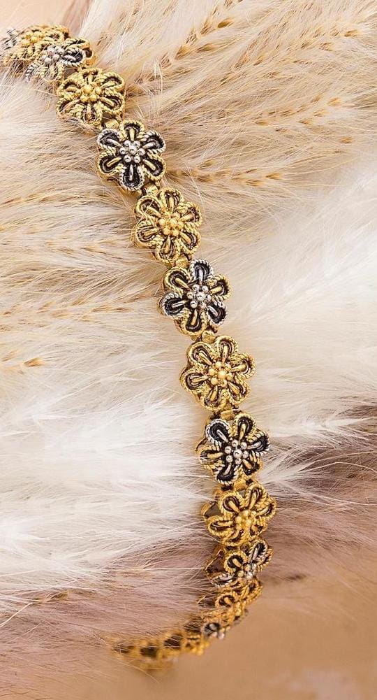 Set of stacked gold bangles