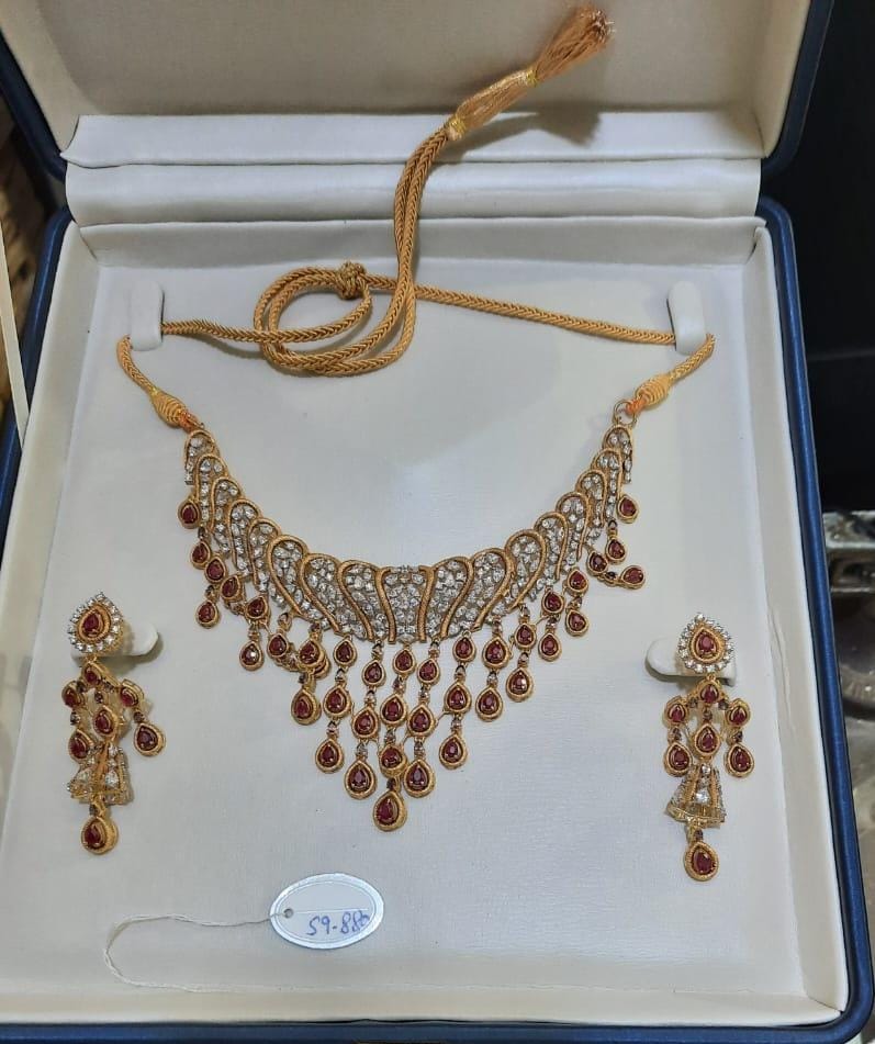 Gold bridal set with intricate detailing