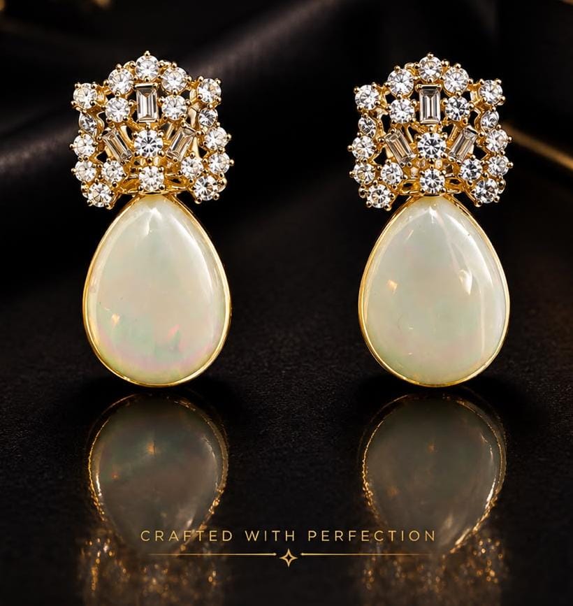 Teardrop opal earrings with a cluster diamond crown